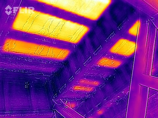 Thermal image of bad insulation in the walls of the living room.