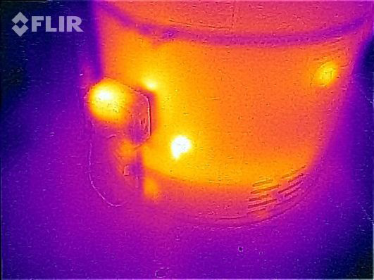 Thermal image of a hot water tank in the garage.